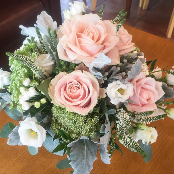 Veronica accents this bridal bouquet